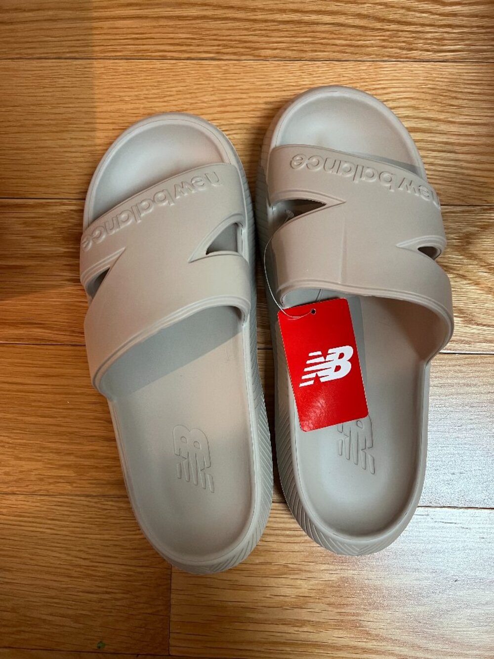 New balance slide sandals in stone